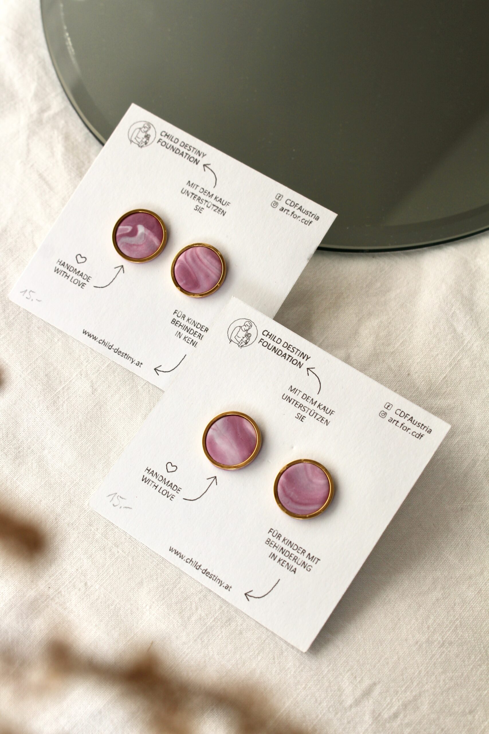 Ohrstecker: Rosa mit Fassung